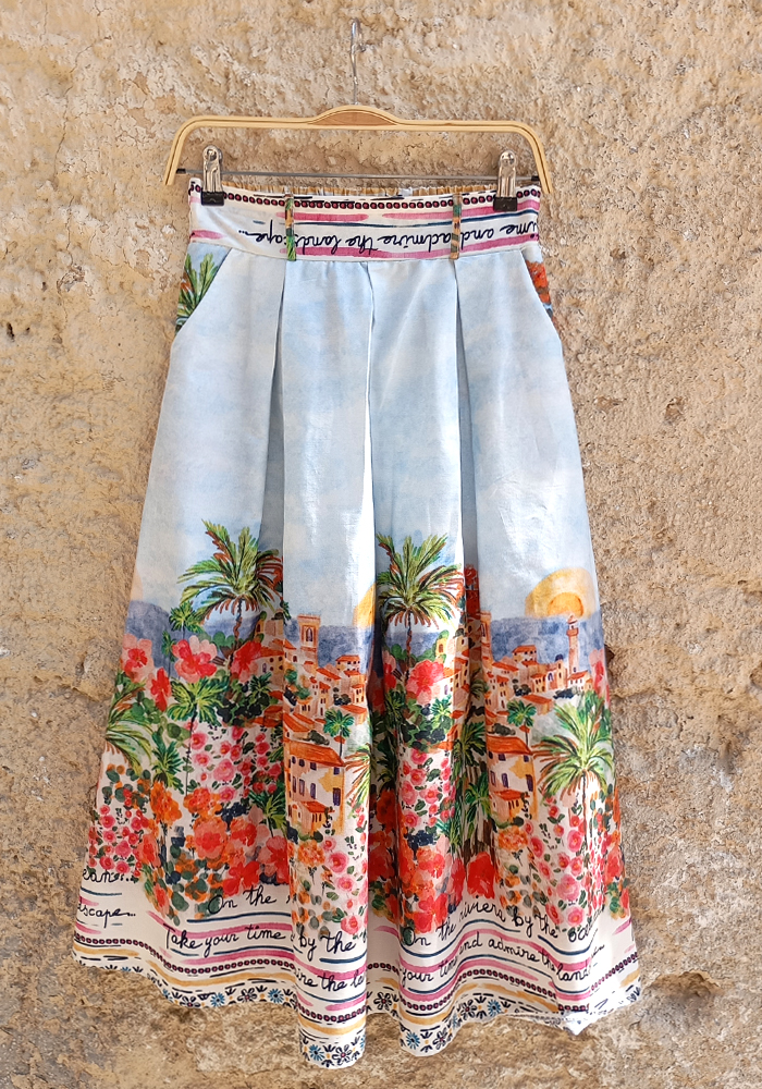 καλοκαιρινή φούστα με print ριβιέρας και φλοράλ μοτίβα σε midi μήκος